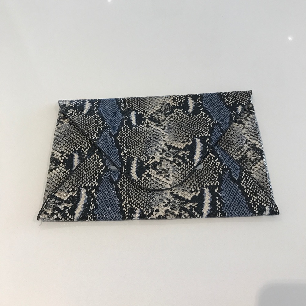 BCBG snake skin clutch